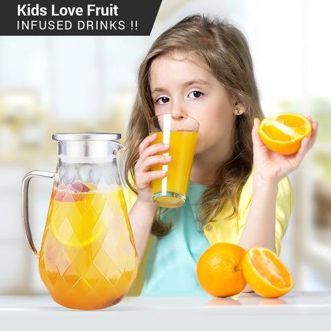 Image of glass pitcher with orange drink